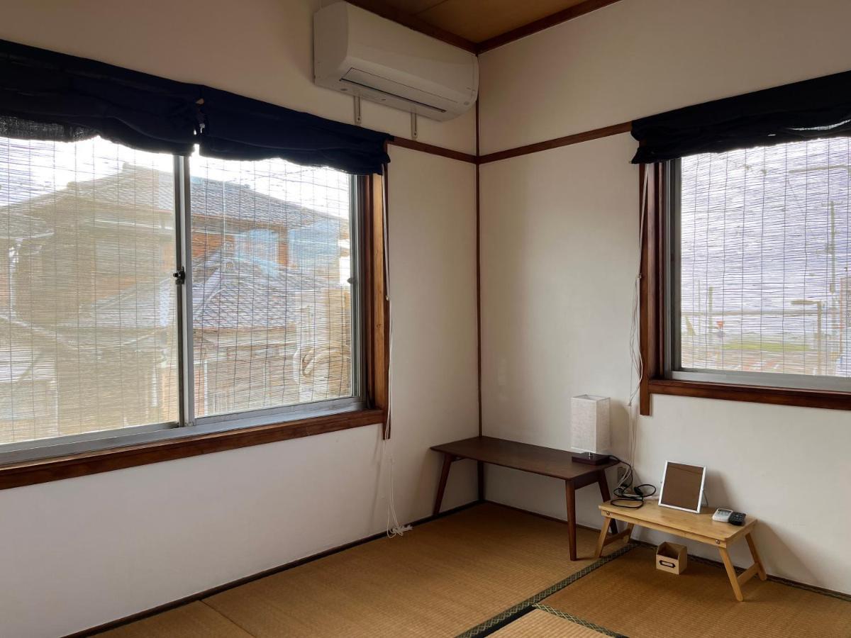 Guesthouse紫雲 Kanonji Bagian luar foto